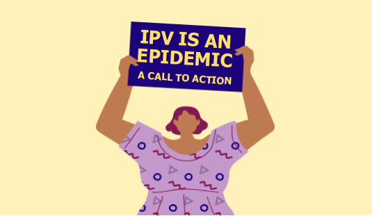 Woman holding sign that says IPV is an epidemic: A call to action